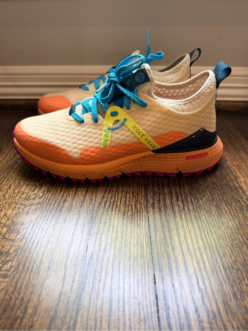 Cole Haan Woman’s Cream, Orange, Pink & Blue Spikeless Golf Shoes